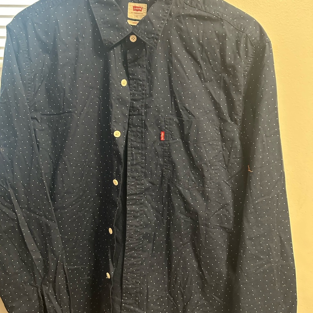 Levi  
Blue shirt